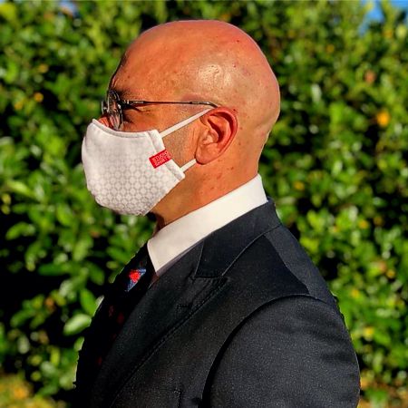 A man wearing a Studio Shirts Mask