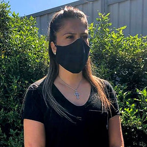 A Girl wearing a Studio Shirts Mask